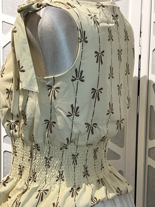 BOW LINE PATTERN TIE SHOULDER SLEEVELESS BLOUSE