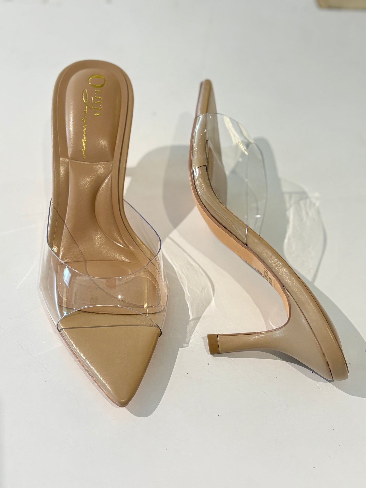 Pointed toe clear heel