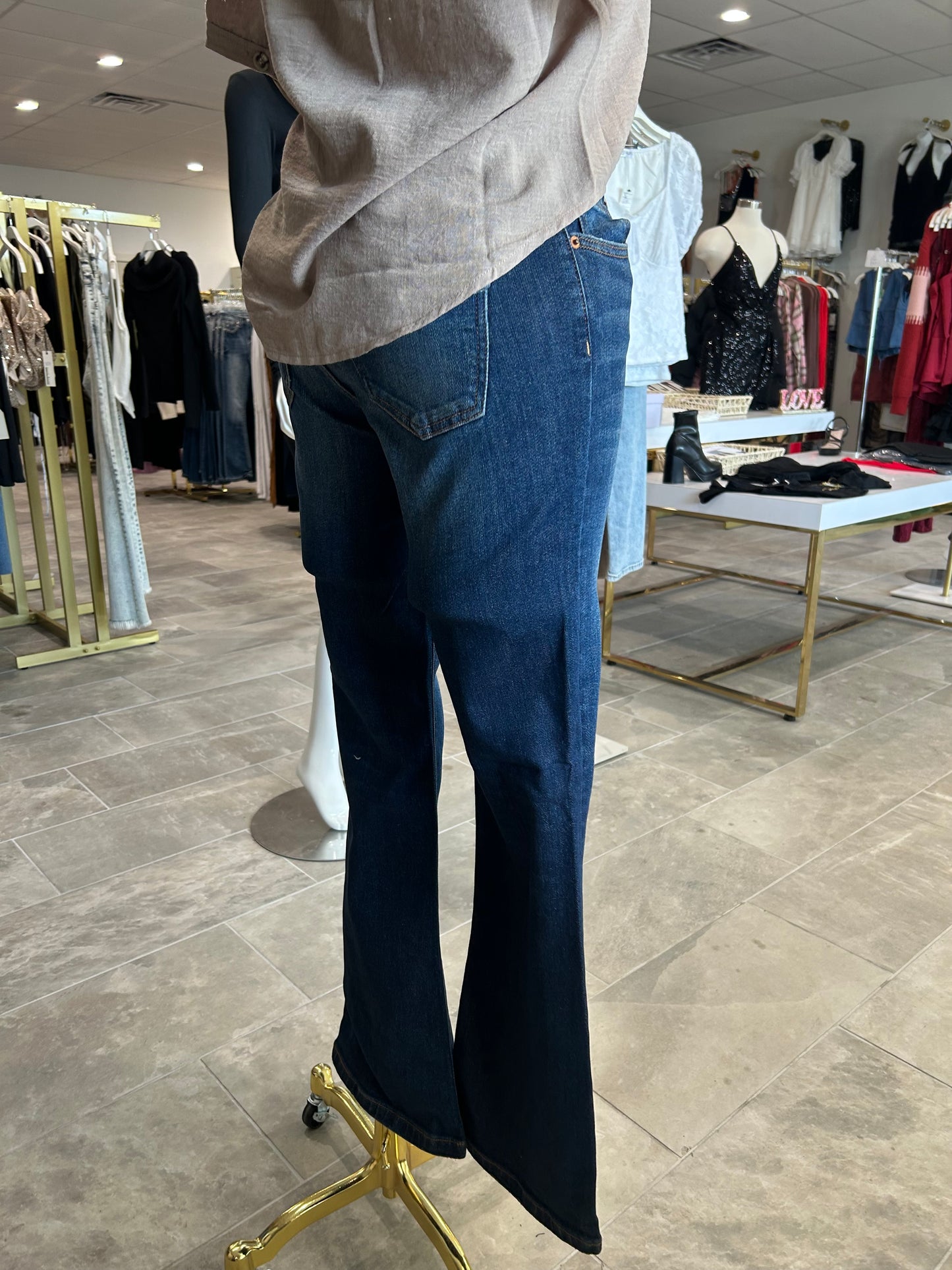 Mid Rise Bootcut Jean With Flap Back Pockets