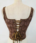 Sleeveless embroidered top with lace up front and back detail