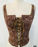 Sleeveless embroidered top with lace up front and back detail