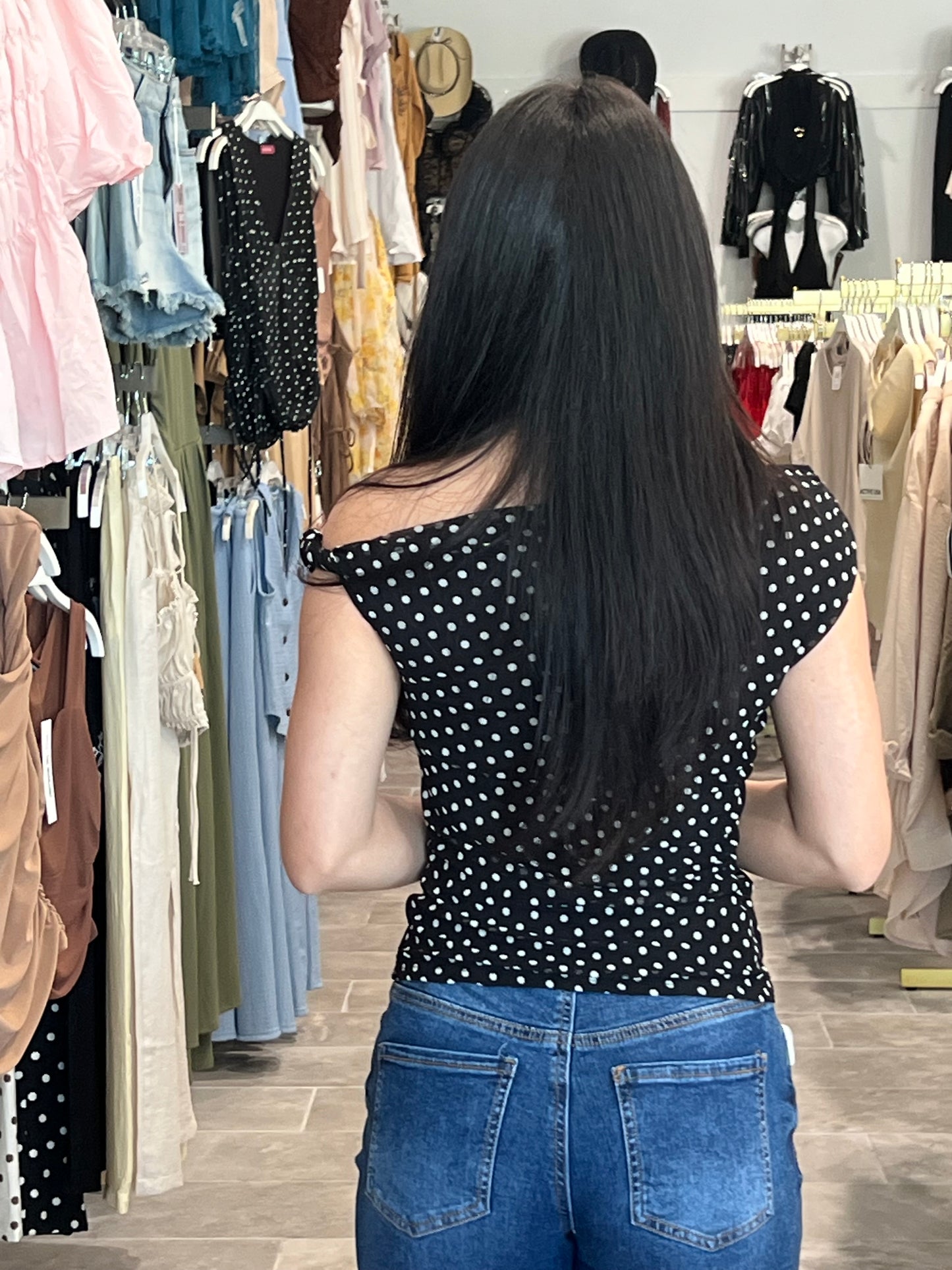 Black polka dot top