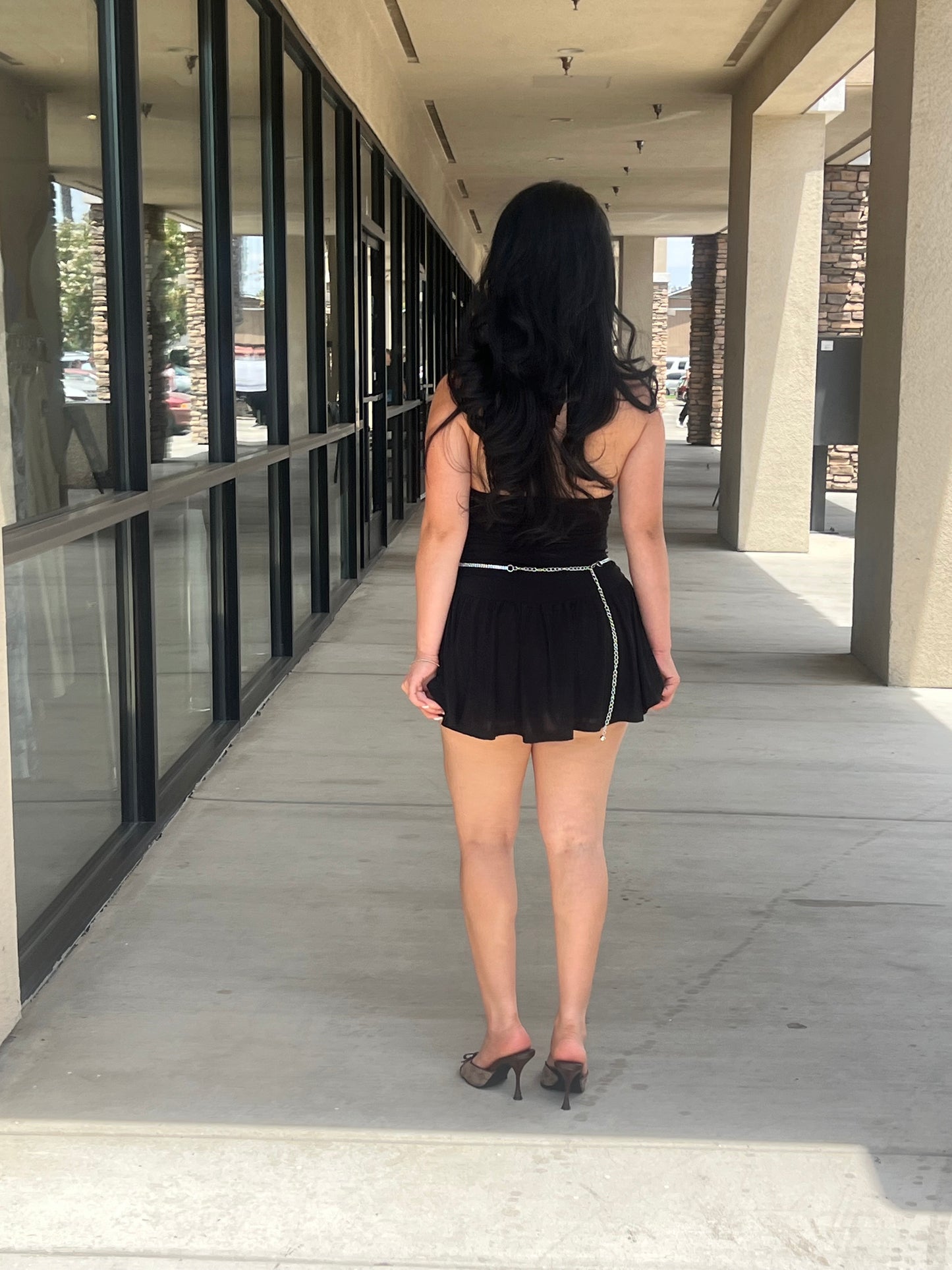 Sleeveless open back halter ruffled romper