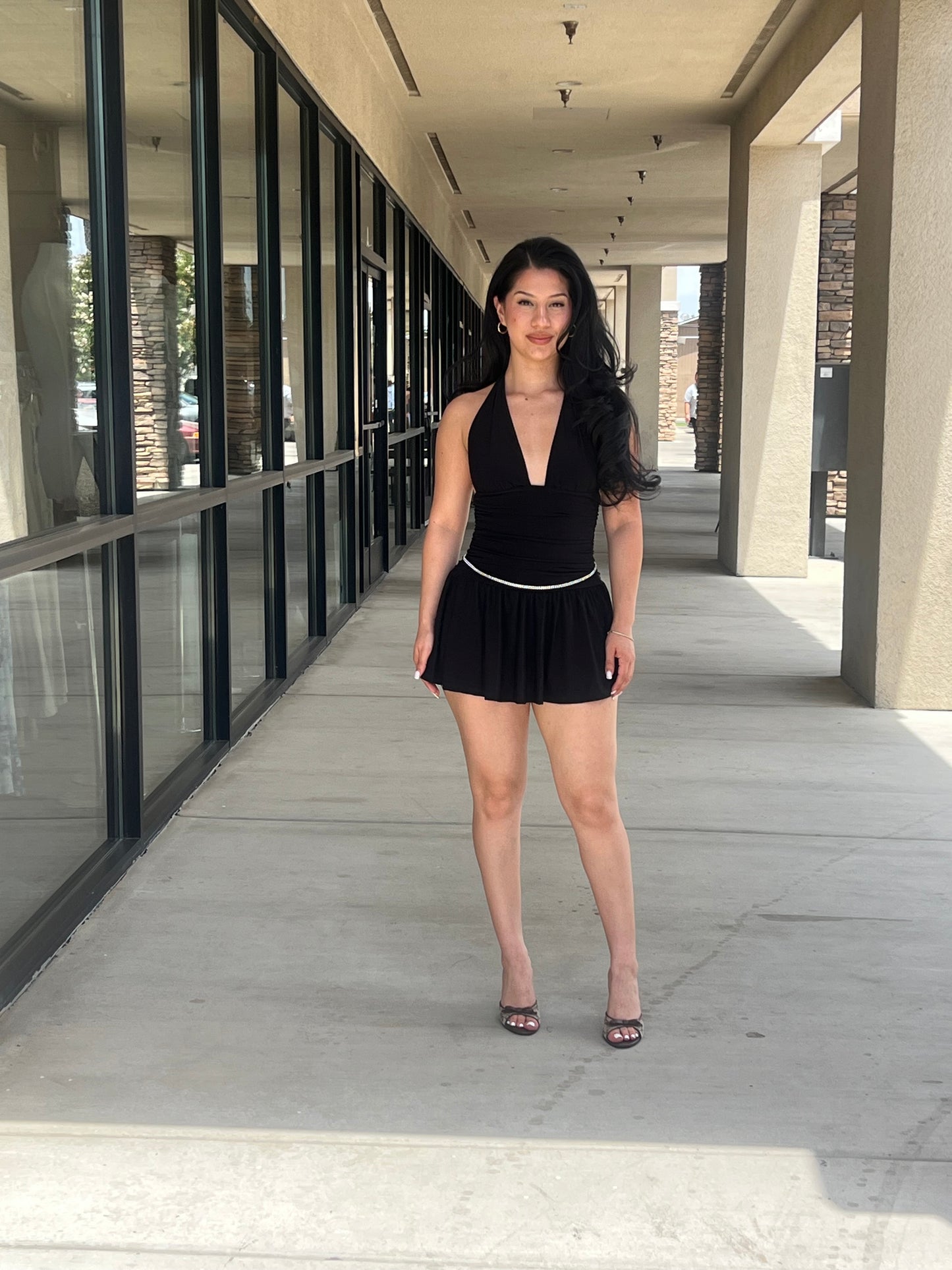 Sleeveless open back halter ruffled romper