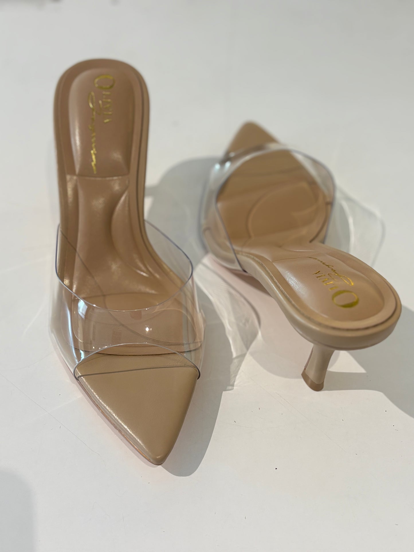 Pointed toe clear heel